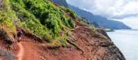 Hiker on the Kalalau Trail in Kauai, Hawaii