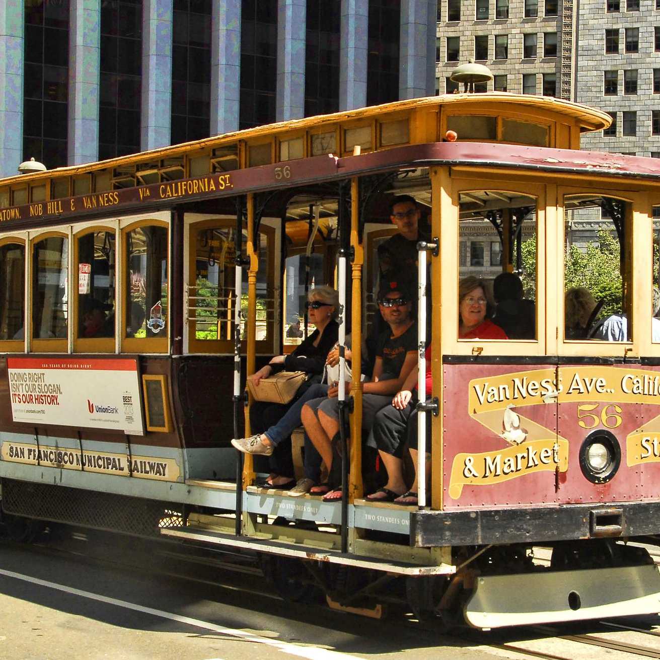 Travellers on the cable car in San Francisco | Graham H.